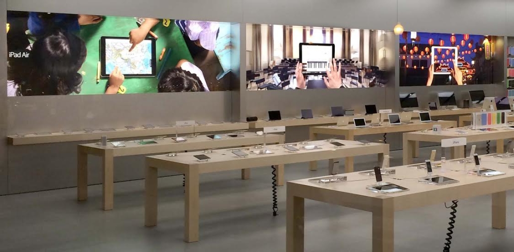 Apple communicates its universe around products by broadcasting videos, (advertisings) on TV.